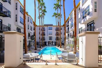 swimming pool and poolside lounging areas at Roosevelt Square apartments